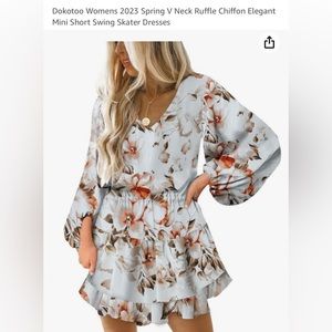 Women’s V Neck short swing dress.  Size: Large.  New without tags
